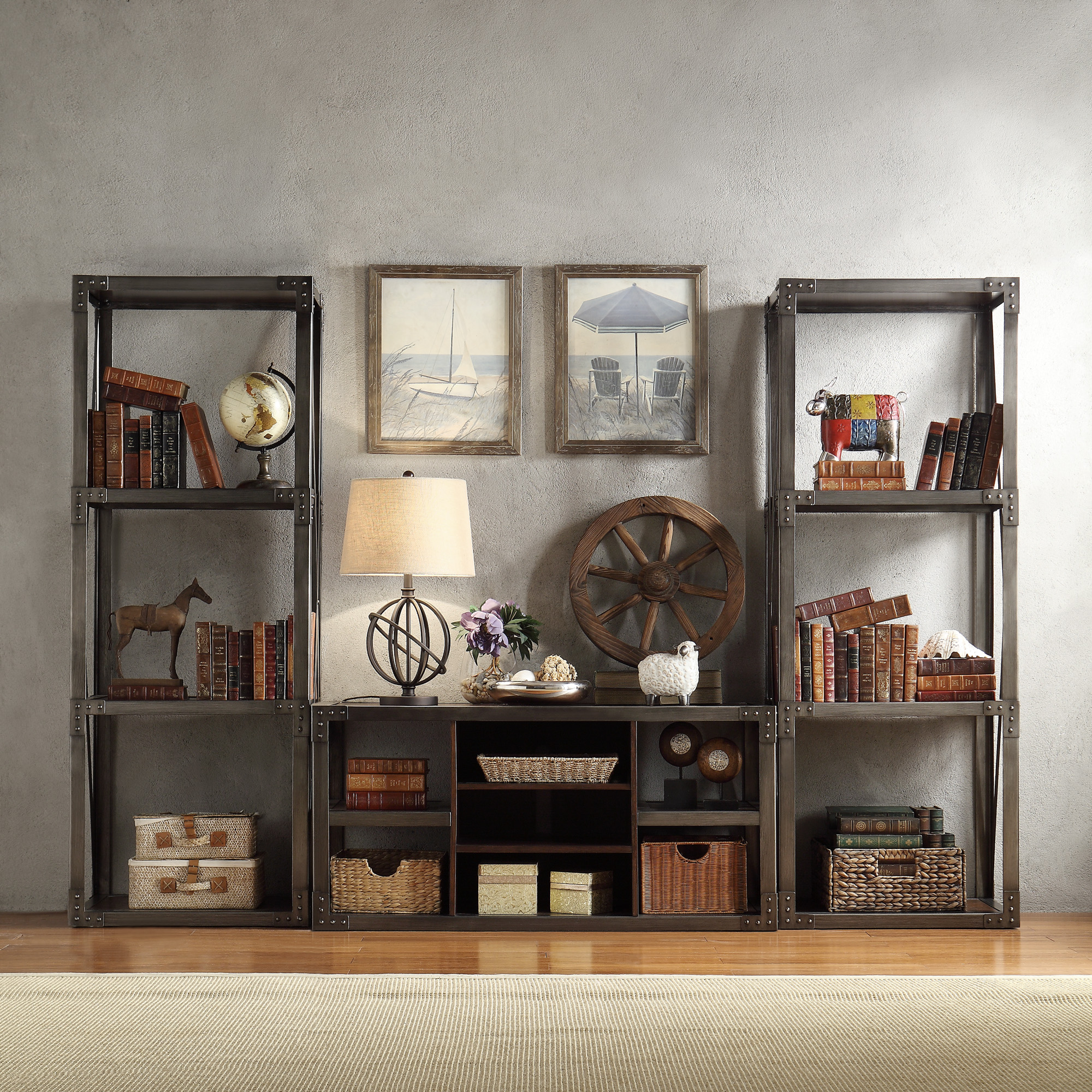 This is one of the iNSPIRE Q entertainment centers to showcase how to decorate a bookshelf. There are two bookcases and a TV stand, all crafted with metal with a distinct industrial aesthetic. The shelves are all decorated with brown books, brown baskets, and brown pieces of décor to enhance the Old World vibe.