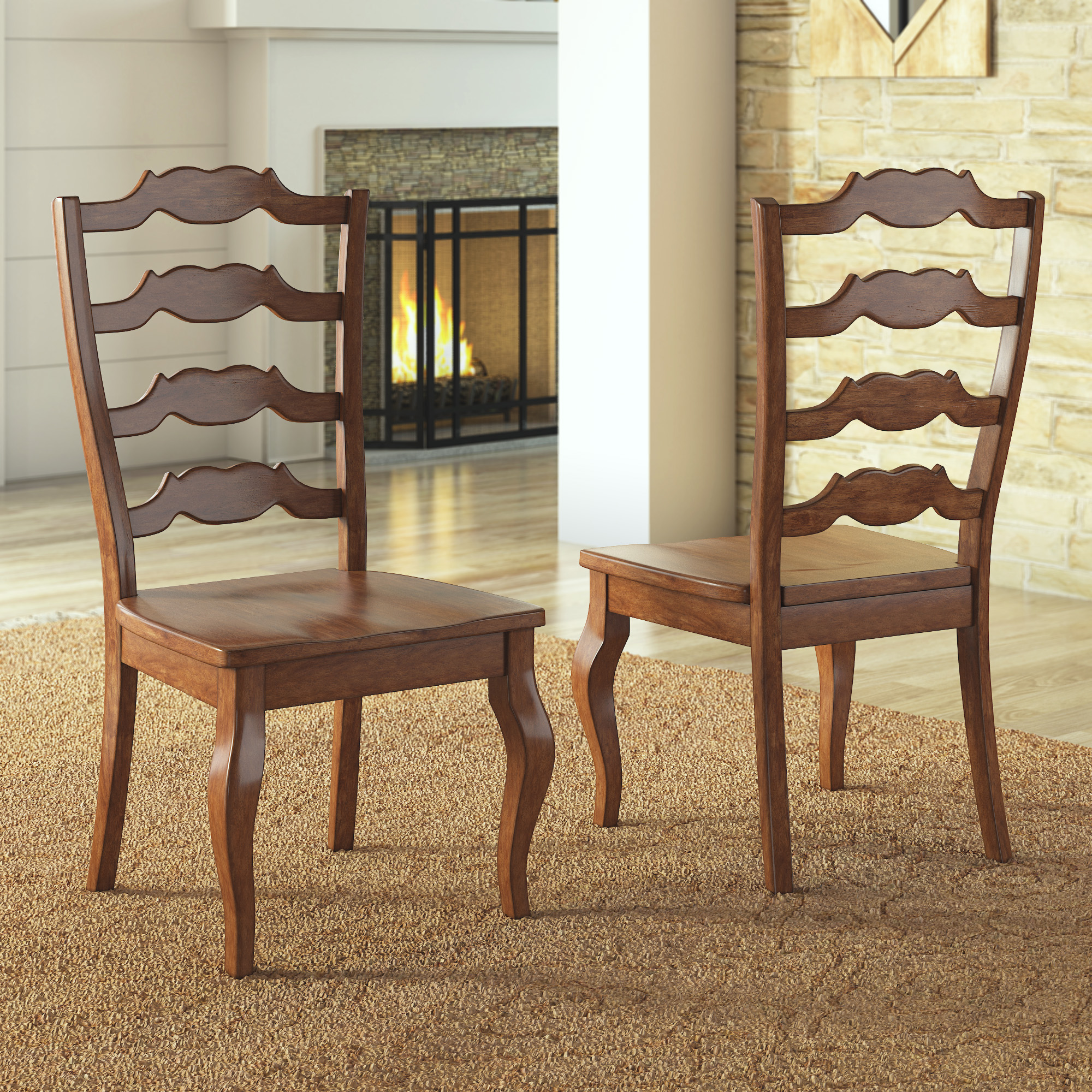Cabriole is one of the more little-known furniture terms to know. Pictured are the French Ladder Back Wood Dining Chairs (Set of 2) in an oak finish by iNSPIRE Q Classic. The two front legs of the dining chairs have the cabriole style, with the gentle S-shaped curves.