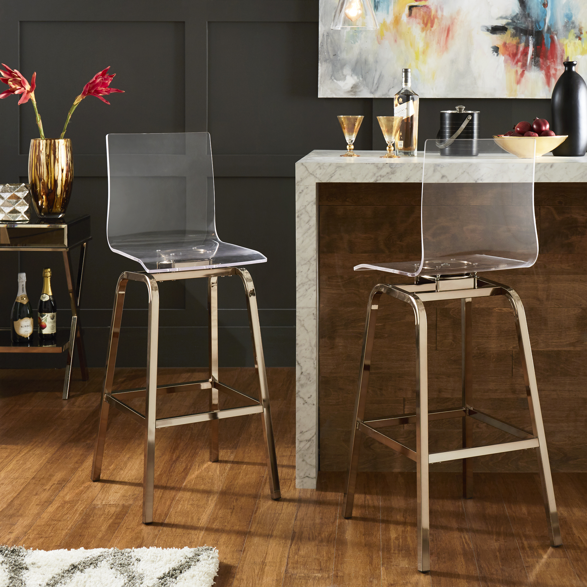 What may surprise some people is that one common furniture material is acrylic. Pictured here are the Acrylic Swivel High Back Bar Stools (Set of 2) by iNSPIRE Q Bold. The seats of these stools are made entirely with acrylic while the metal bases are finished in shiny champagne gold.