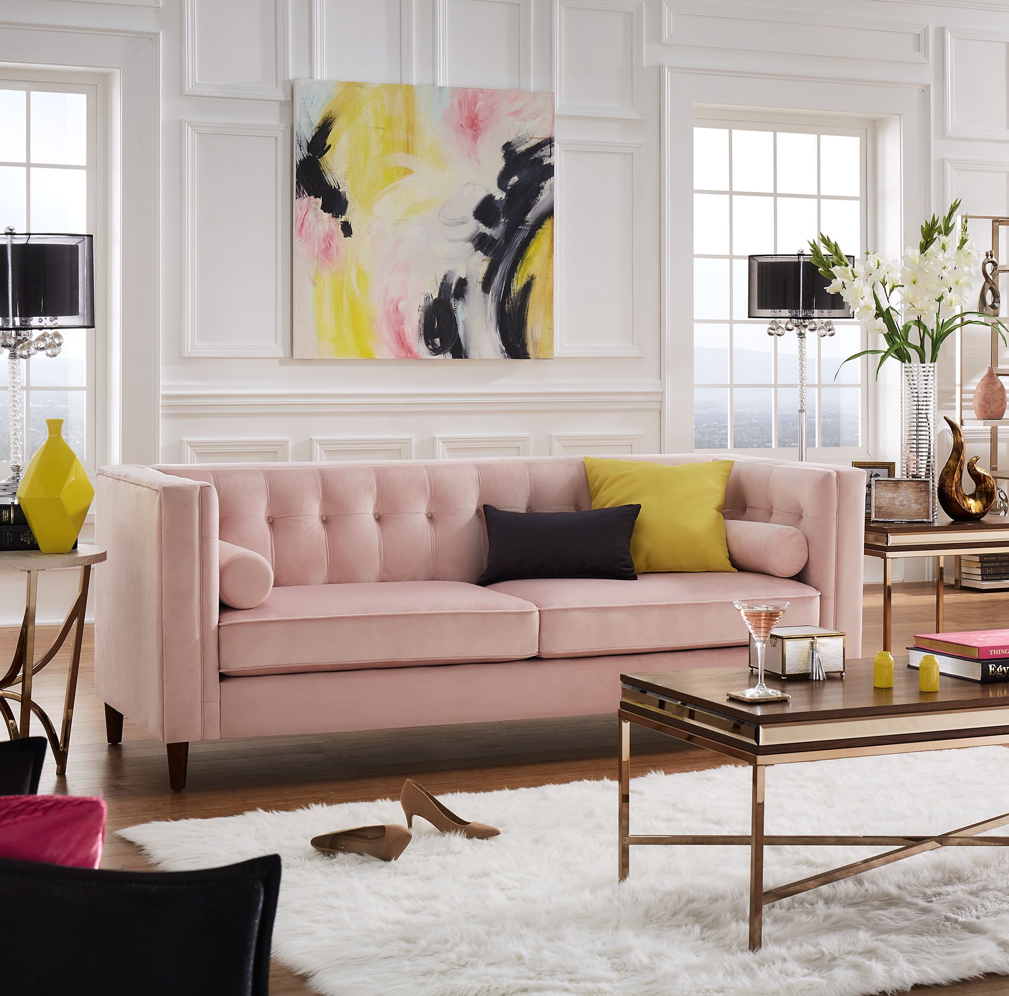 This last image displays the Tuxedo Pink Velvet Sofa with Accent Pillows by iNSPIRE Q Bold. With the tuxedo silhouette, there is button tufting all over the back and arms. There is plenty of room to add even more accent pillows.