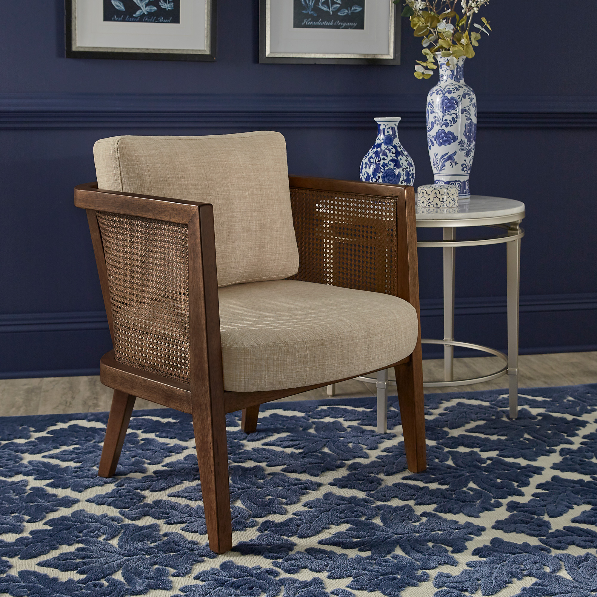 The last of the woods covered in this article is rattan. Pictured here is the Walnut Finish Cane Accent Chair with Beige Linen Upholstered Cushions.