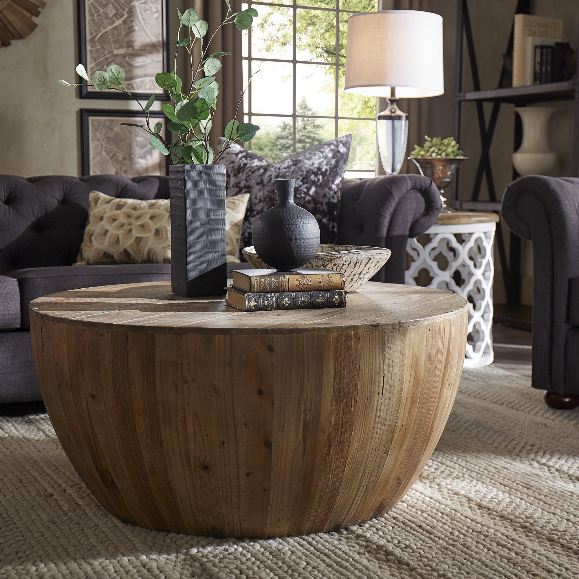 Another common type of wood used for furniture materials is reclaimed wood. In this image, we have the Reclaimed Woodblock Drum Shape Coffee Table by iNSPIRE Q Artisan.